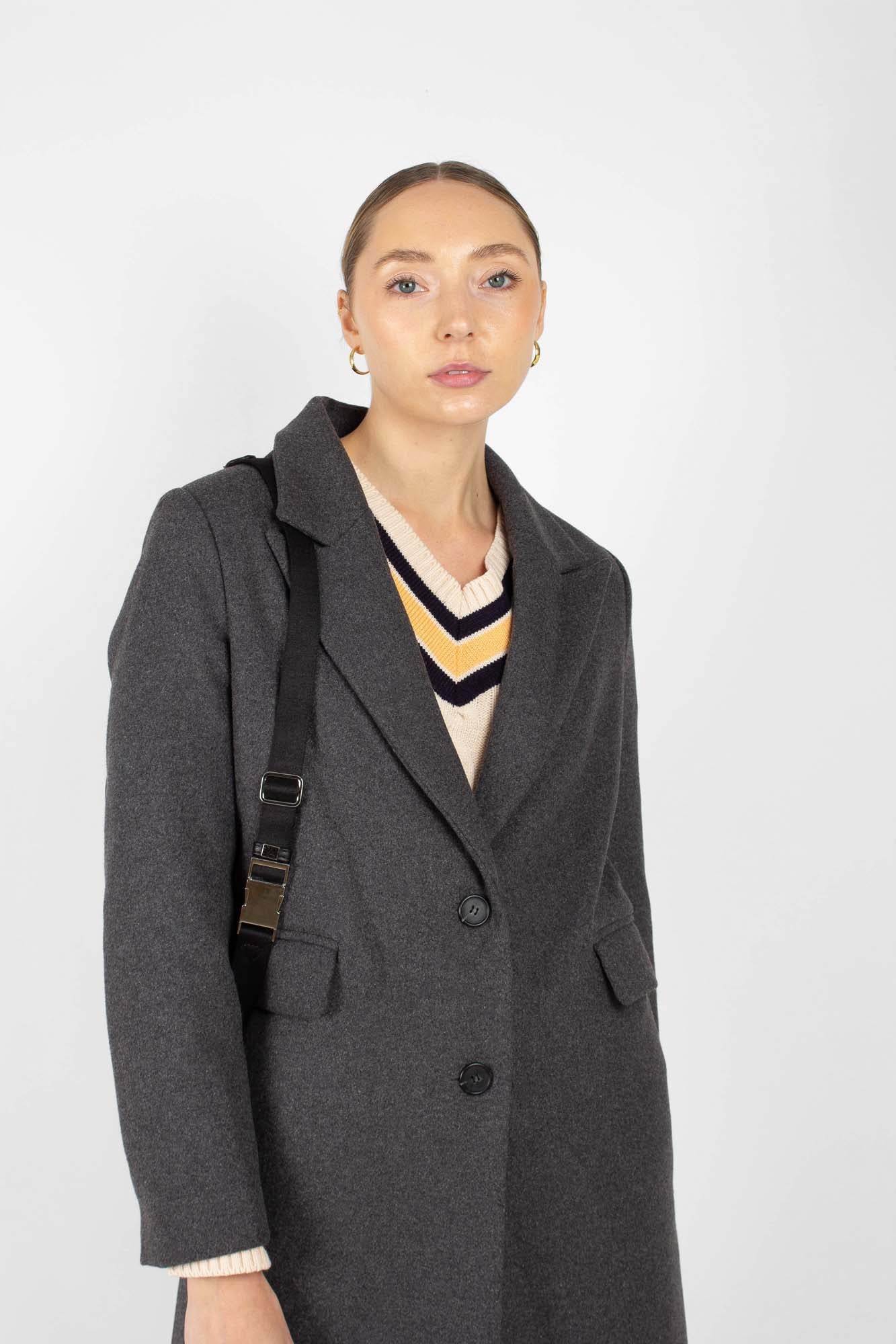 Cream and yellow V-neck cableknit jumper