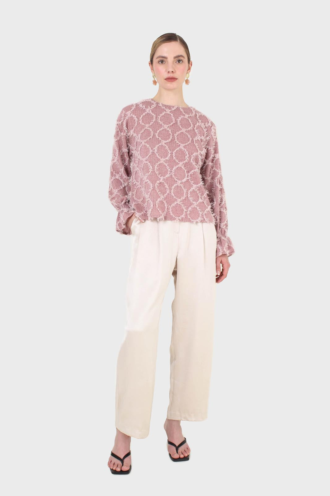 Pale pink cross tuft pattern blouse