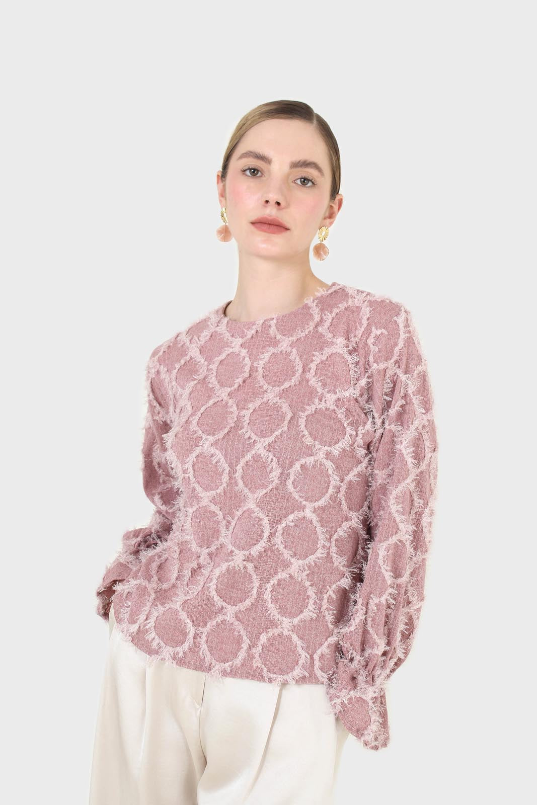 Pale pink cross tuft pattern blouse