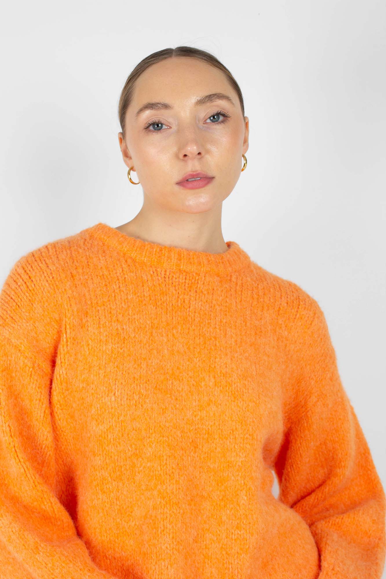 Bright orange crew neck loose fit jumper