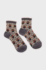 Grey and orange cherry textured socks