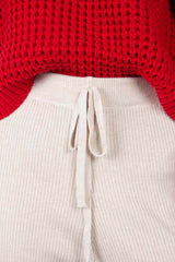 Ivory ribbed loose fit knit trousers
