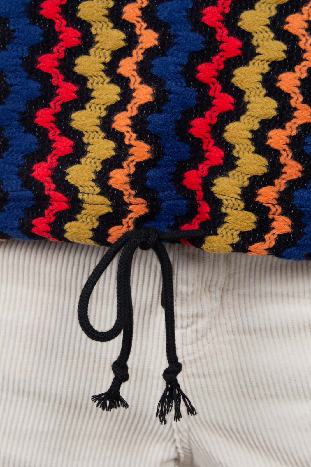 Bold red orange and blue zig-zag jumper