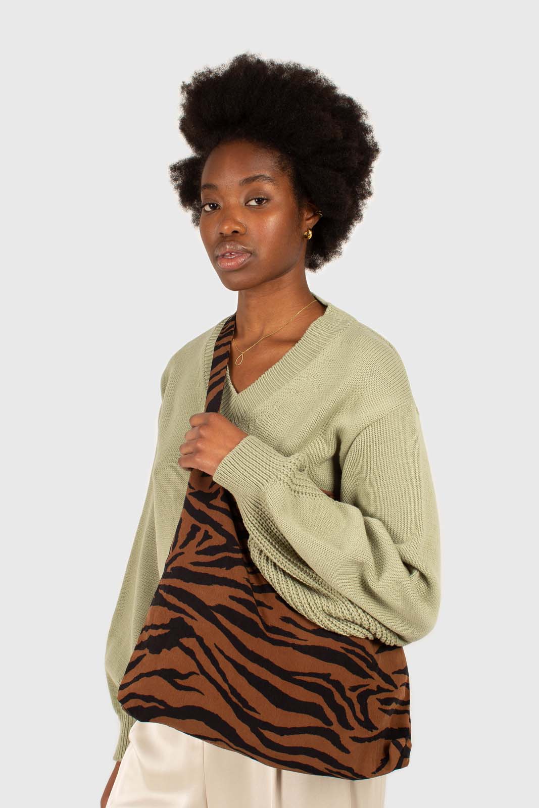 Brown and black zebra print tie strap tote