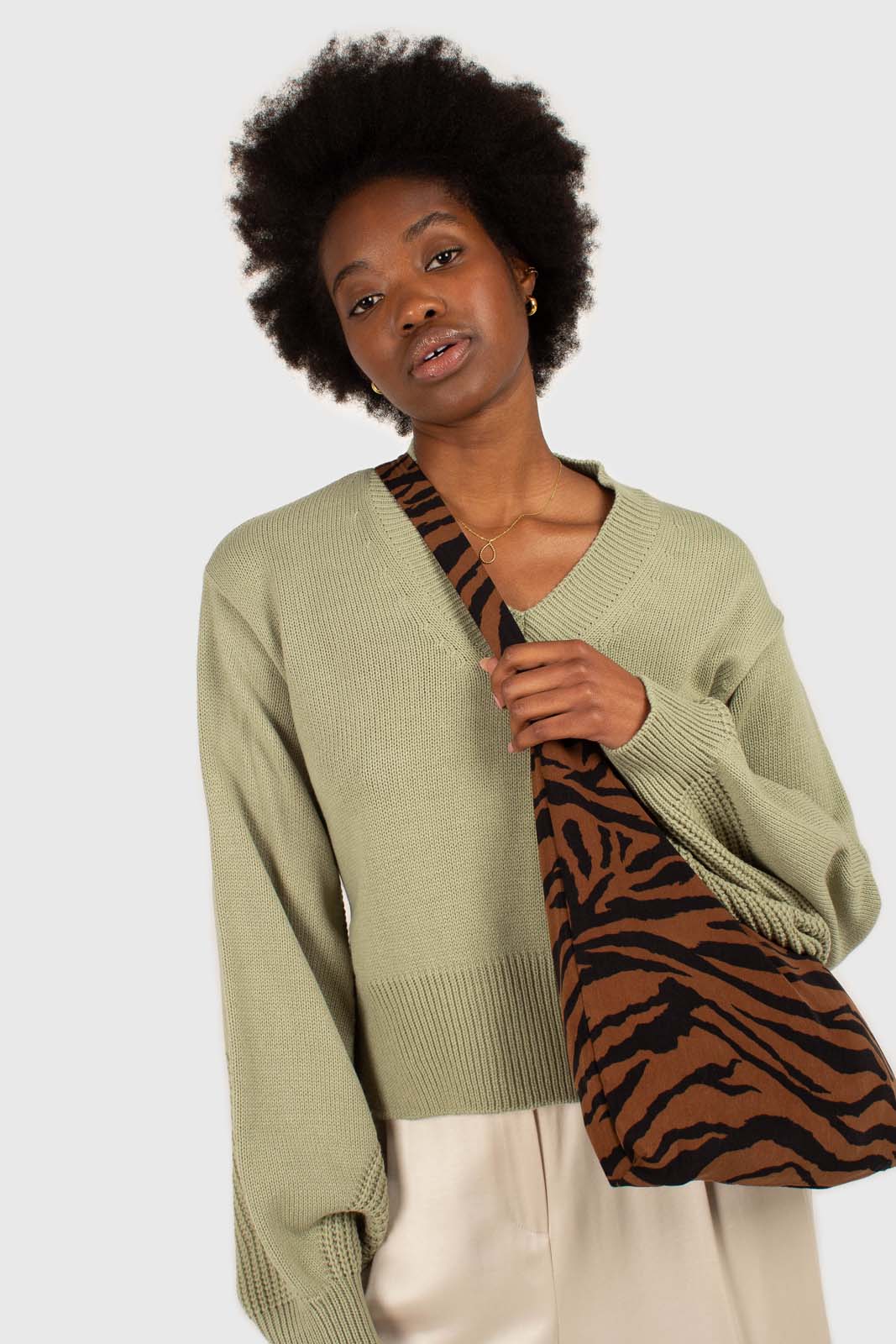 Brown and black zebra print tie strap tote