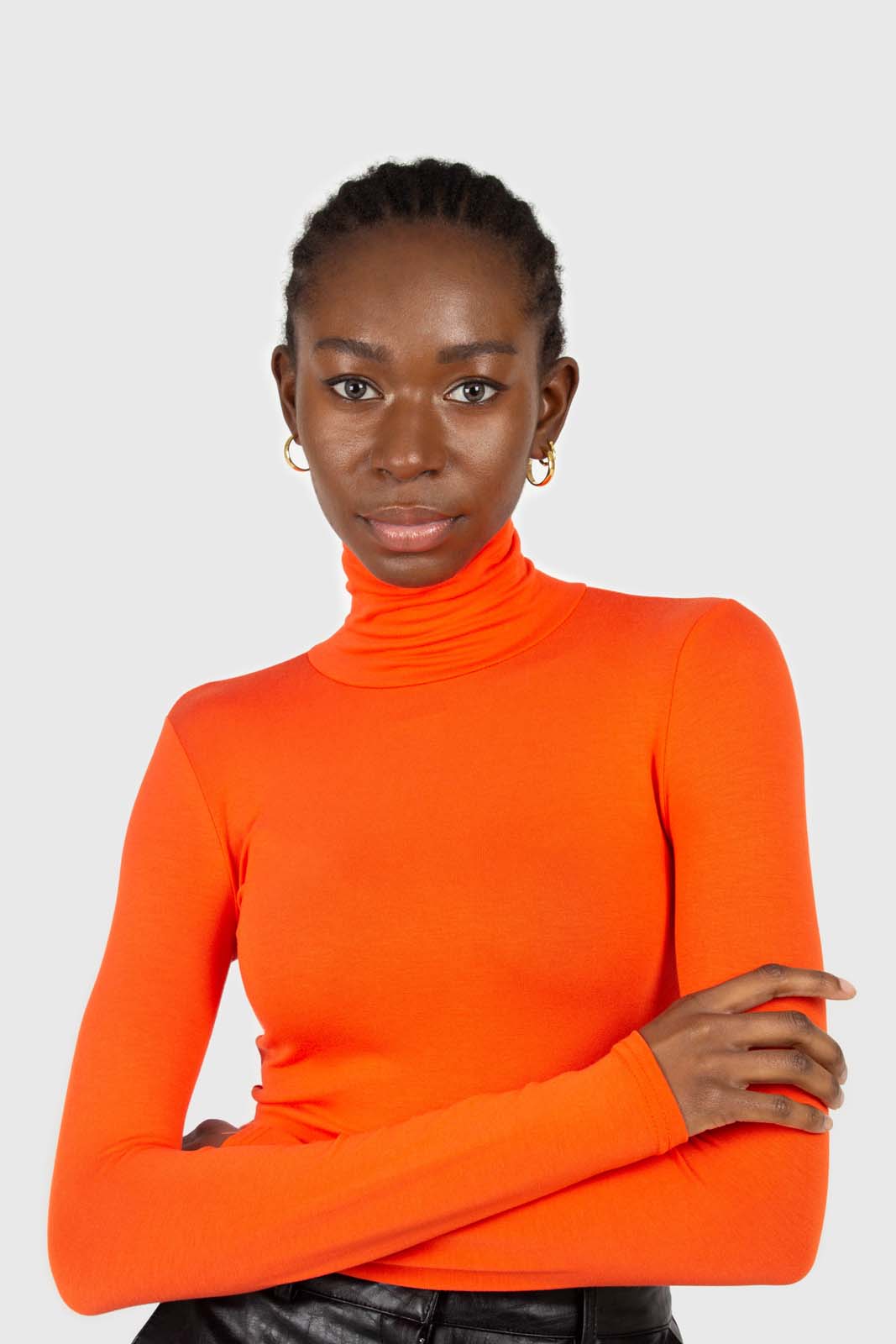 Bright orange soft jersey turtleneck top