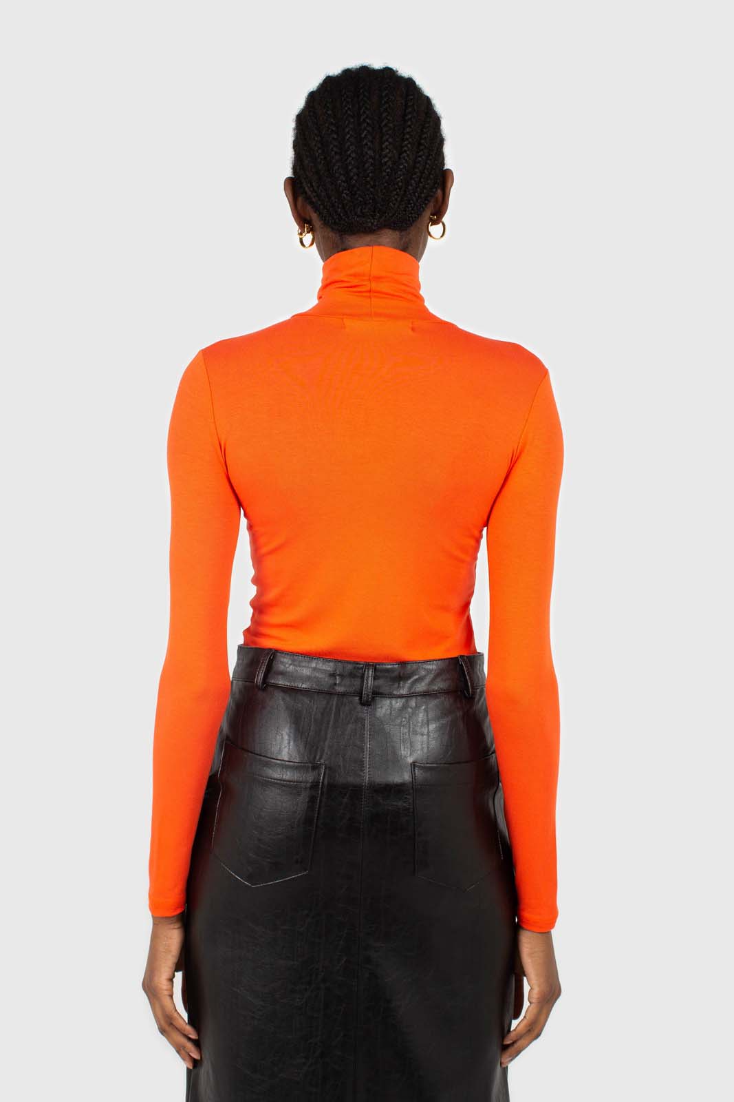 Bright orange soft jersey turtleneck top
