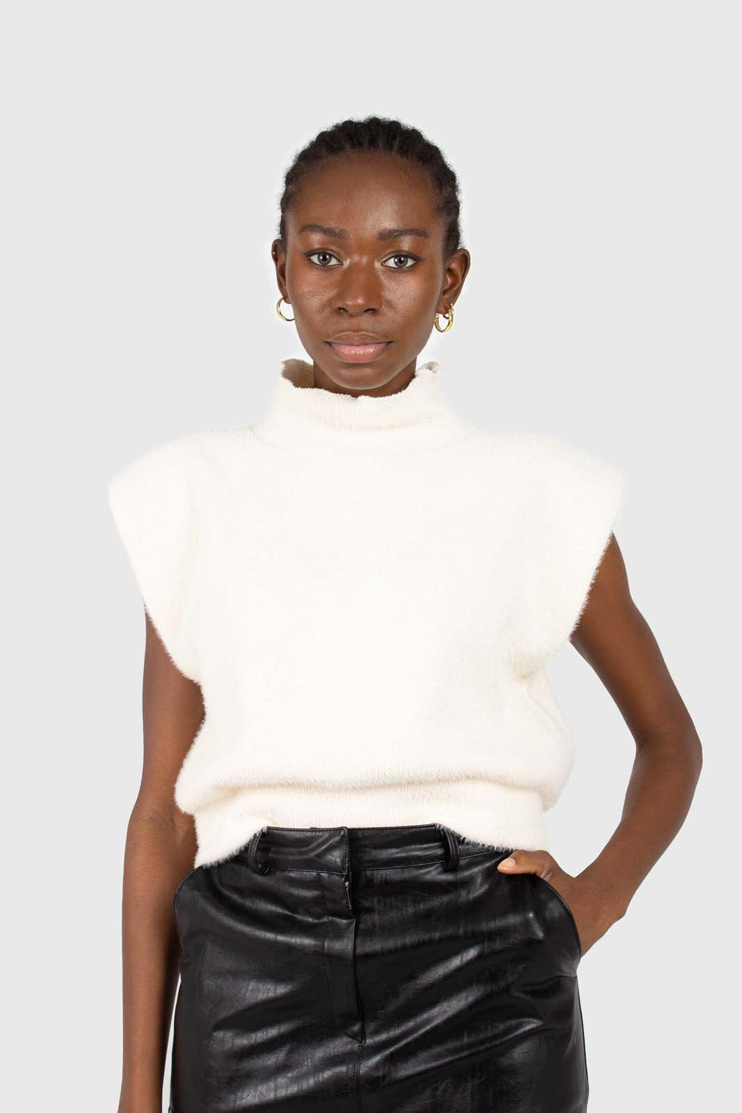 Ivory fuzzy structured shoulder pad vest top