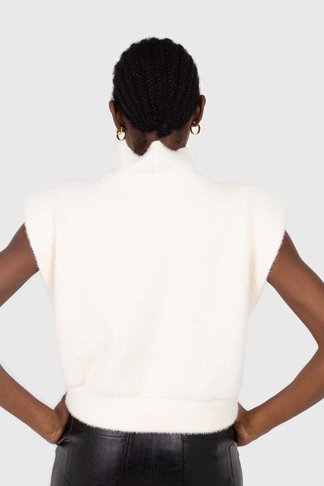 Ivory fuzzy structured shoulder pad vest top