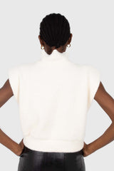 Ivory fuzzy structured shoulder pad vest top