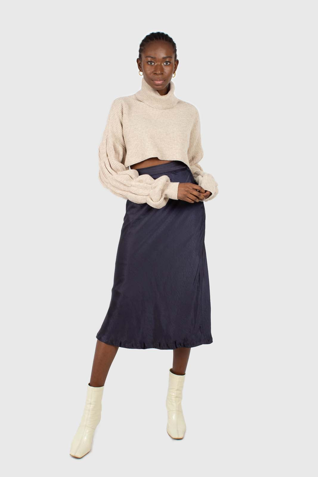 Beige balloon sleeved cropped wool blend turtleneck top