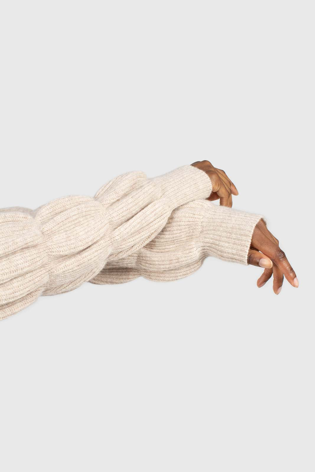 Beige balloon sleeved cropped wool blend turtleneck top