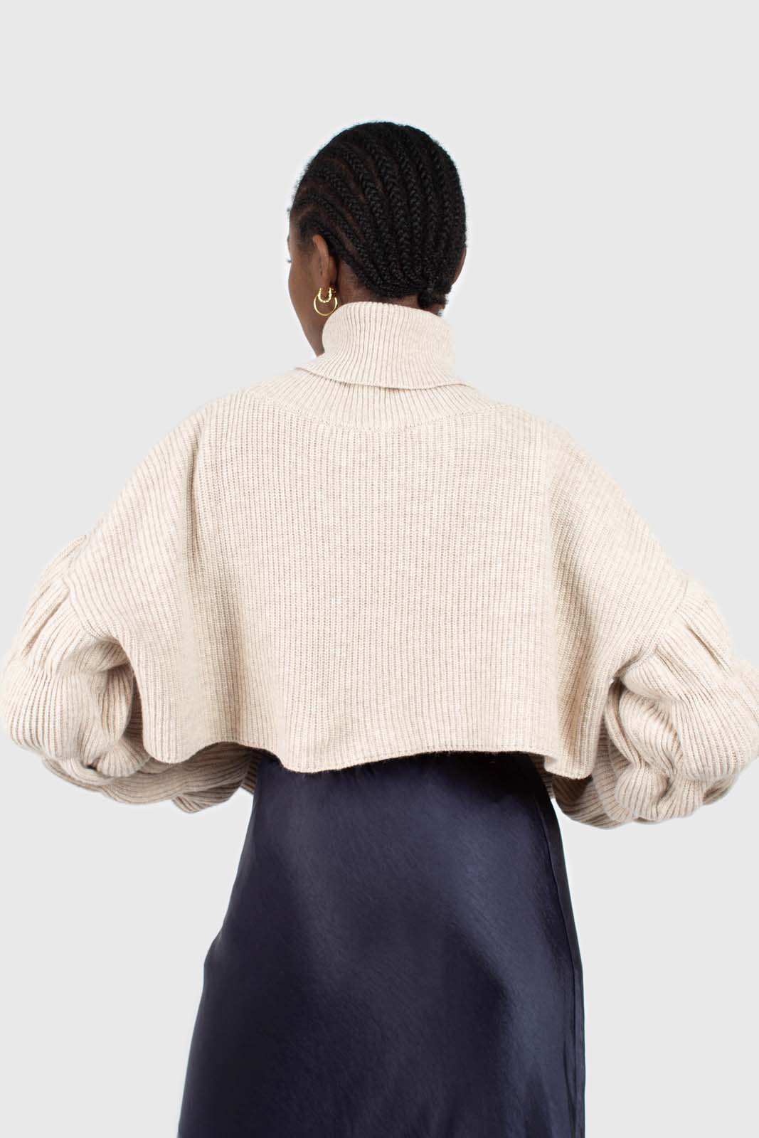 Beige balloon sleeved cropped wool blend turtleneck top