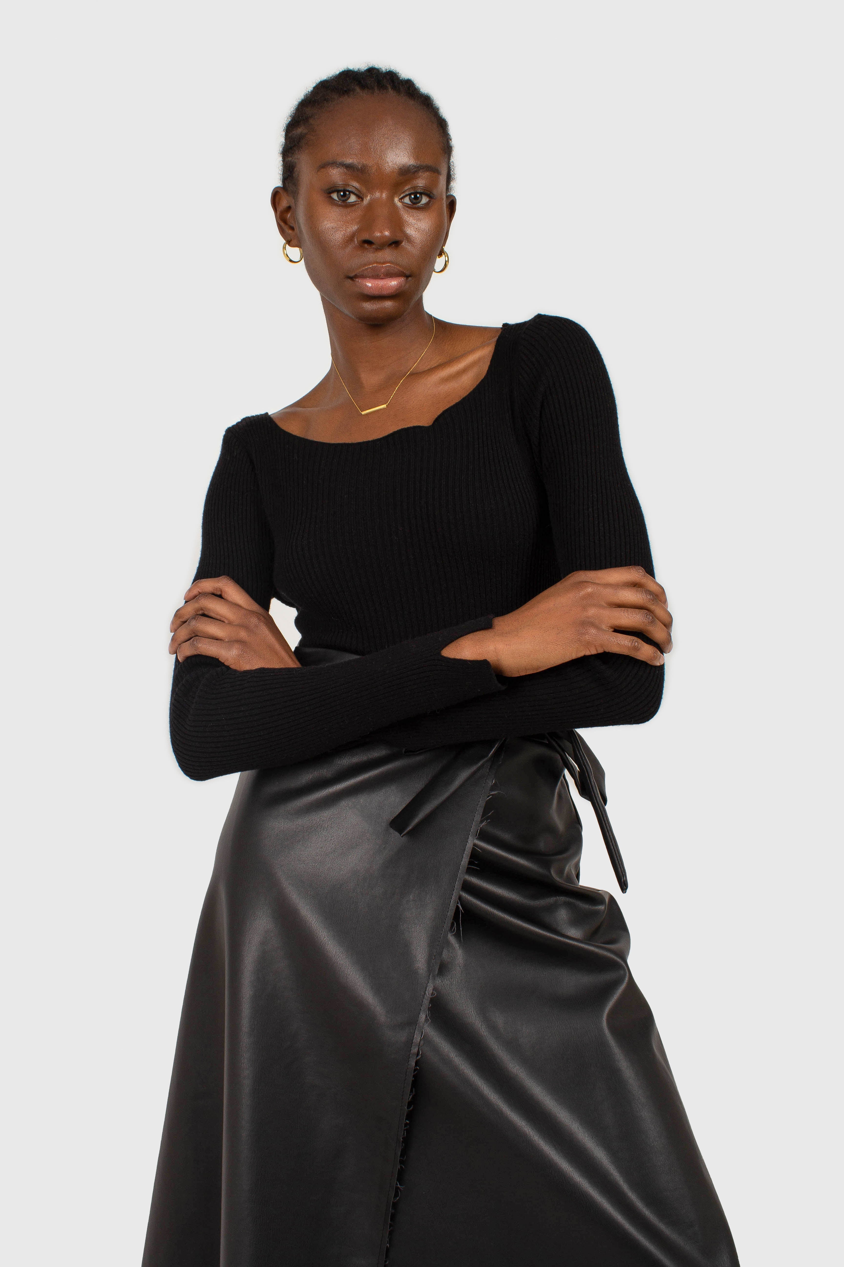 Black cascading hole square neck knit top