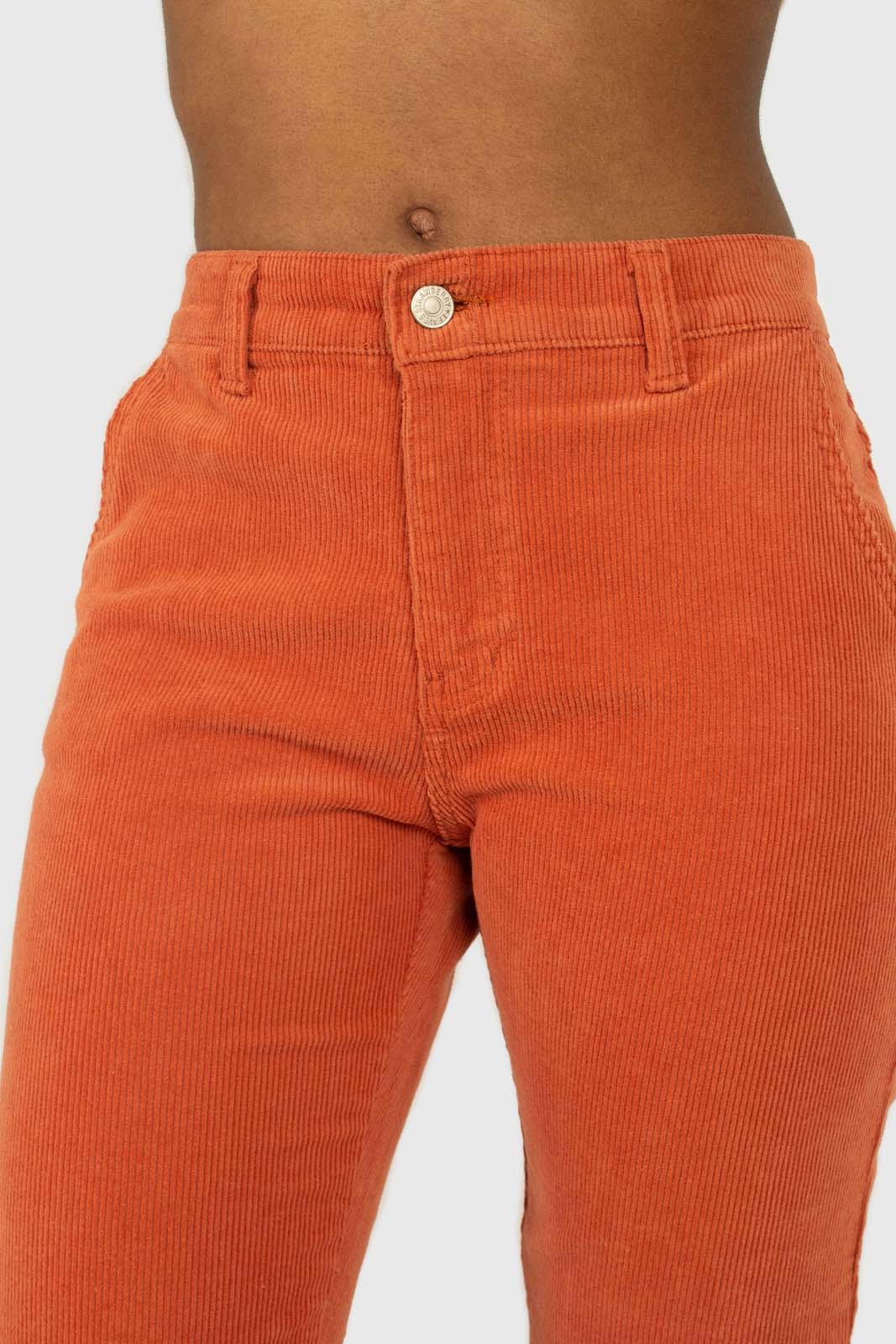 Dusty orange corduroy trousers