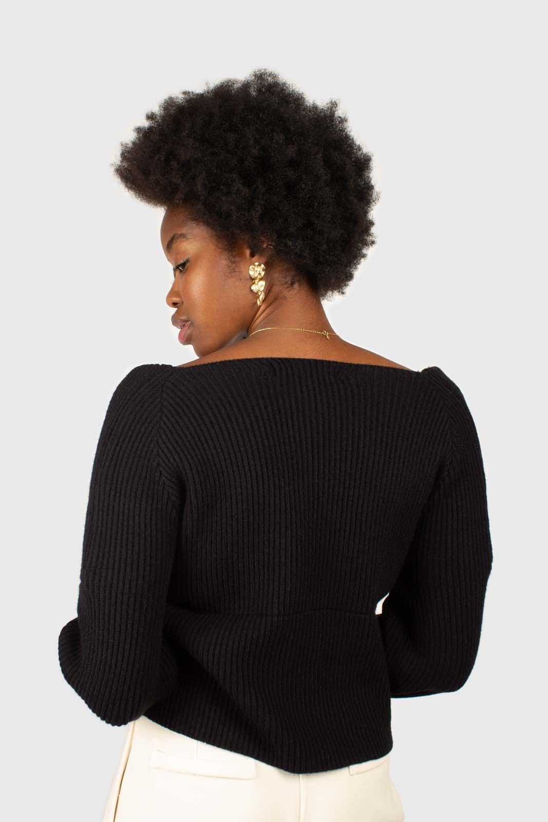 Black cross front panel knit top