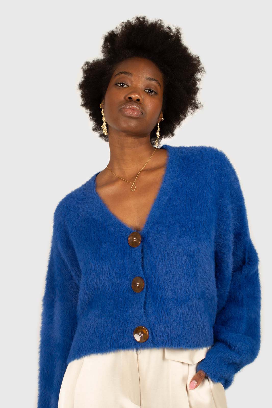 Bright blue fuzzy tortoise shell button cardigan