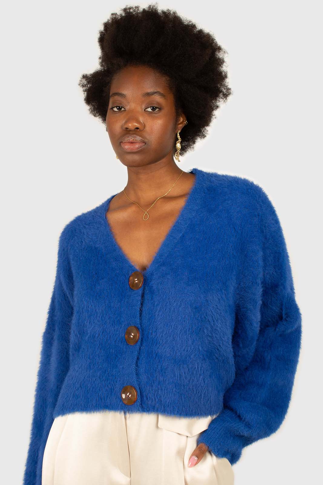 Bright blue fuzzy tortoise shell button cardigan