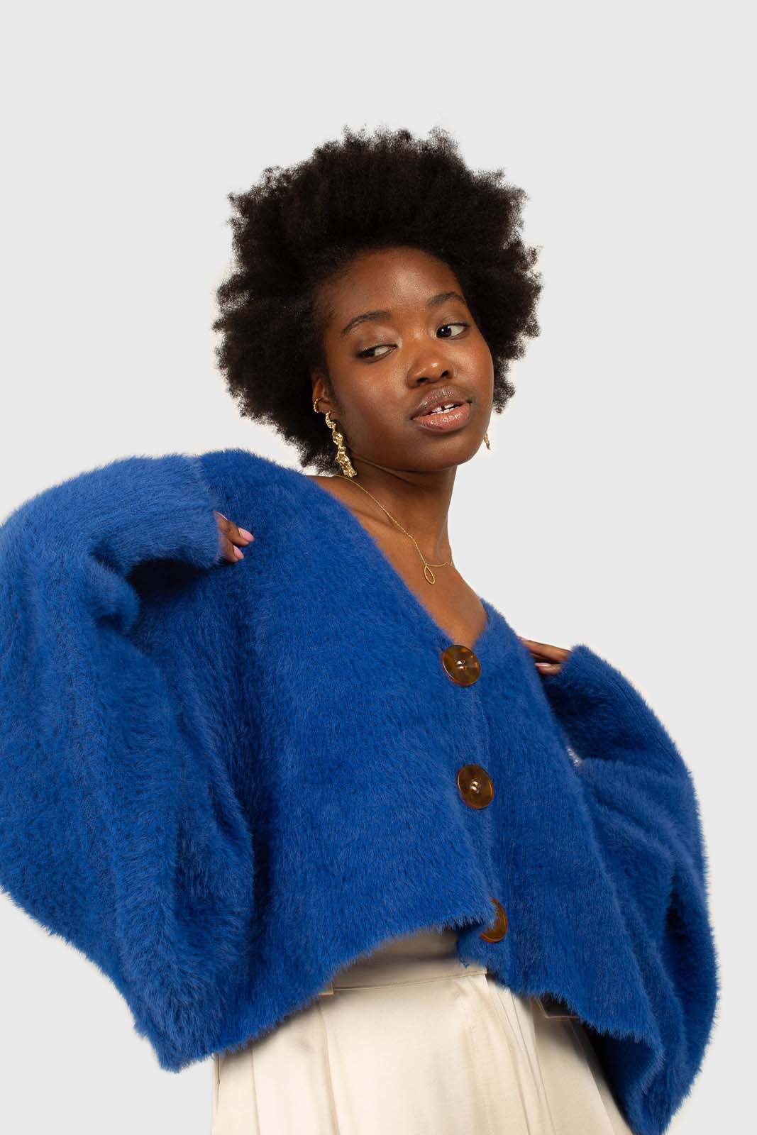 Bright blue fuzzy tortoise shell button cardigan