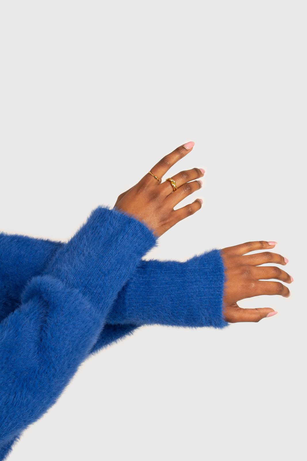 Bright blue fuzzy tortoise shell button cardigan