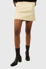 Ivory vegan leather mini skirt