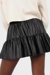 Black shiny vegan leather tiered mini skirt