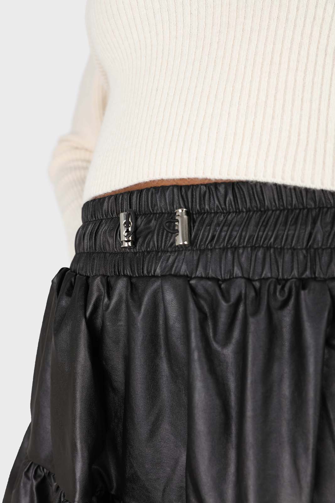 Black shiny vegan leather tiered mini skirt
