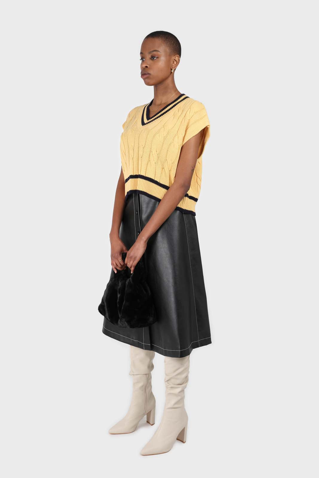 Yellow and black varsity trim cableknit vest