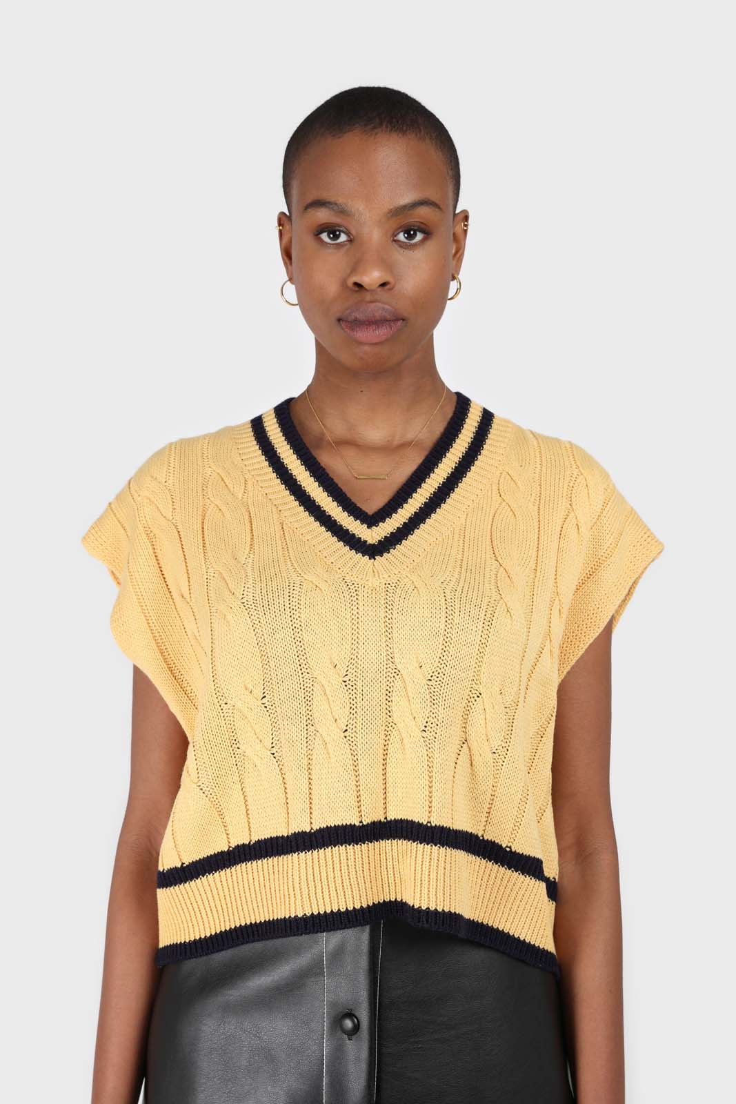 Yellow and black varsity trim cableknit vest