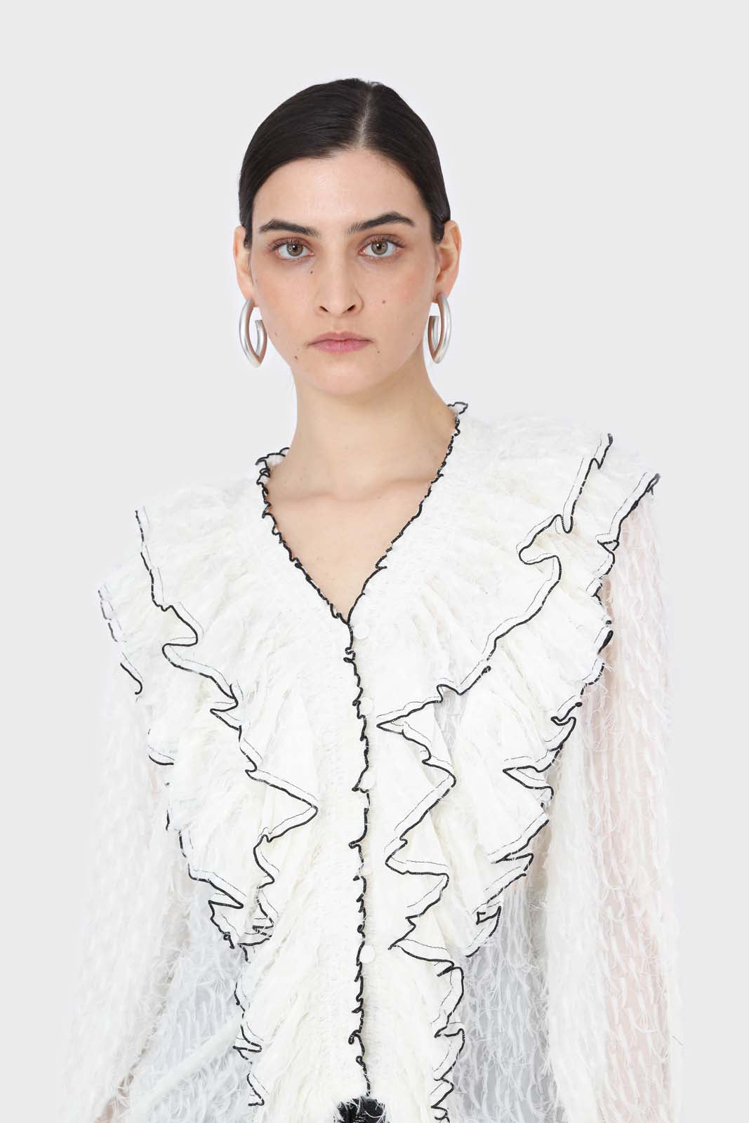 Ivory feather ruffle blouse