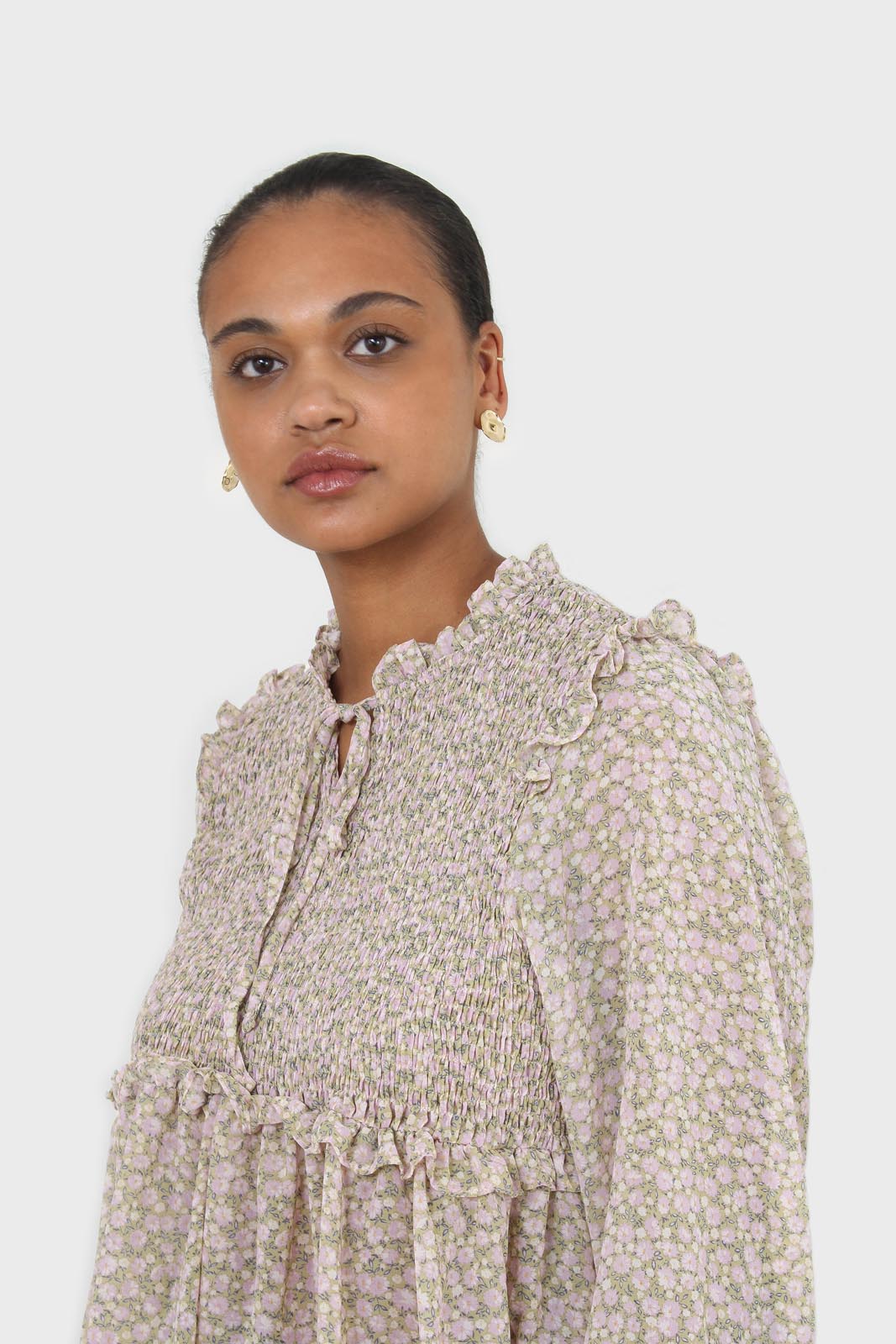 Green and lilac floral print smocked blouse