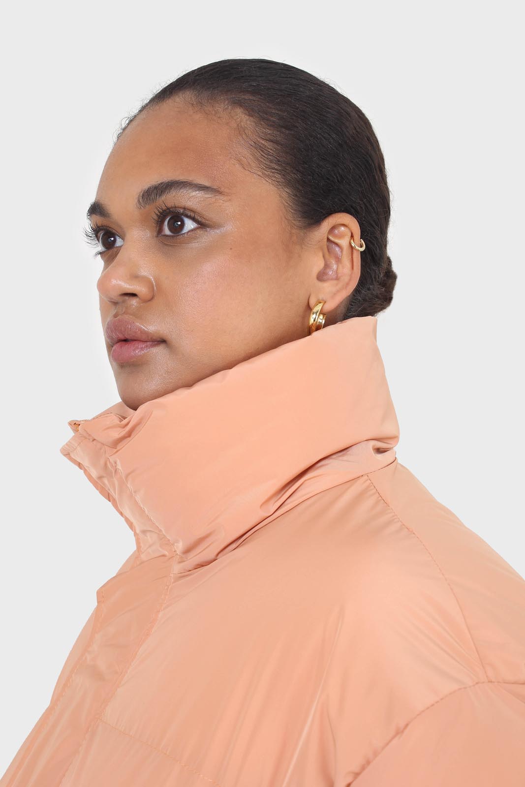 Pale orange puffer jacket