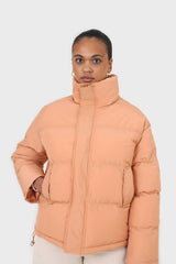 Pale orange puffer jacket