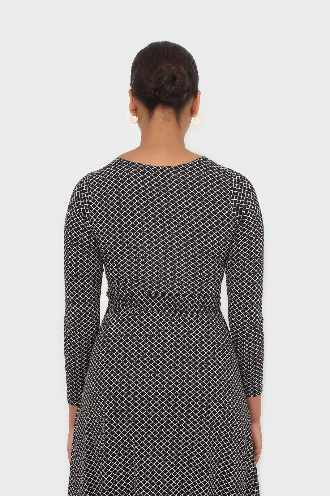 Black and white diamond jersey wrap dress