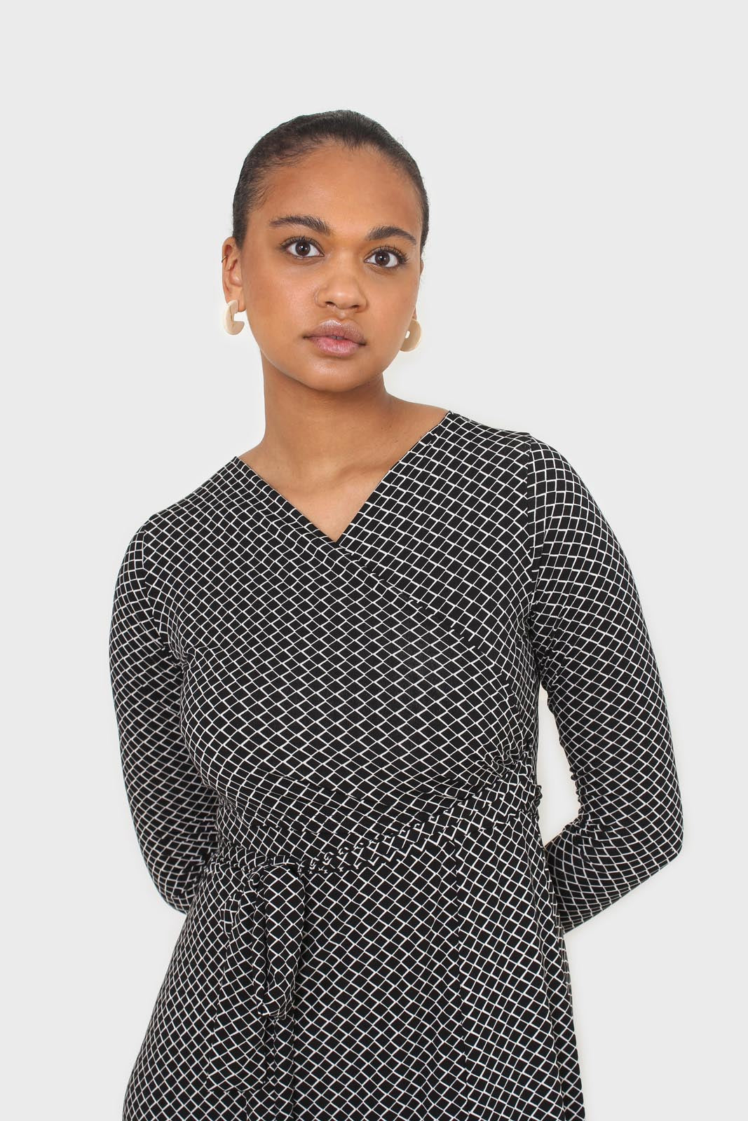 Black and white diamond jersey wrap dress