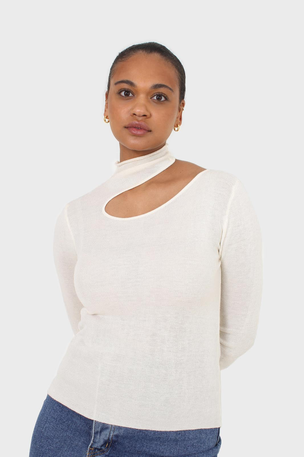 Ivory large cut out fitted knit turtleneck