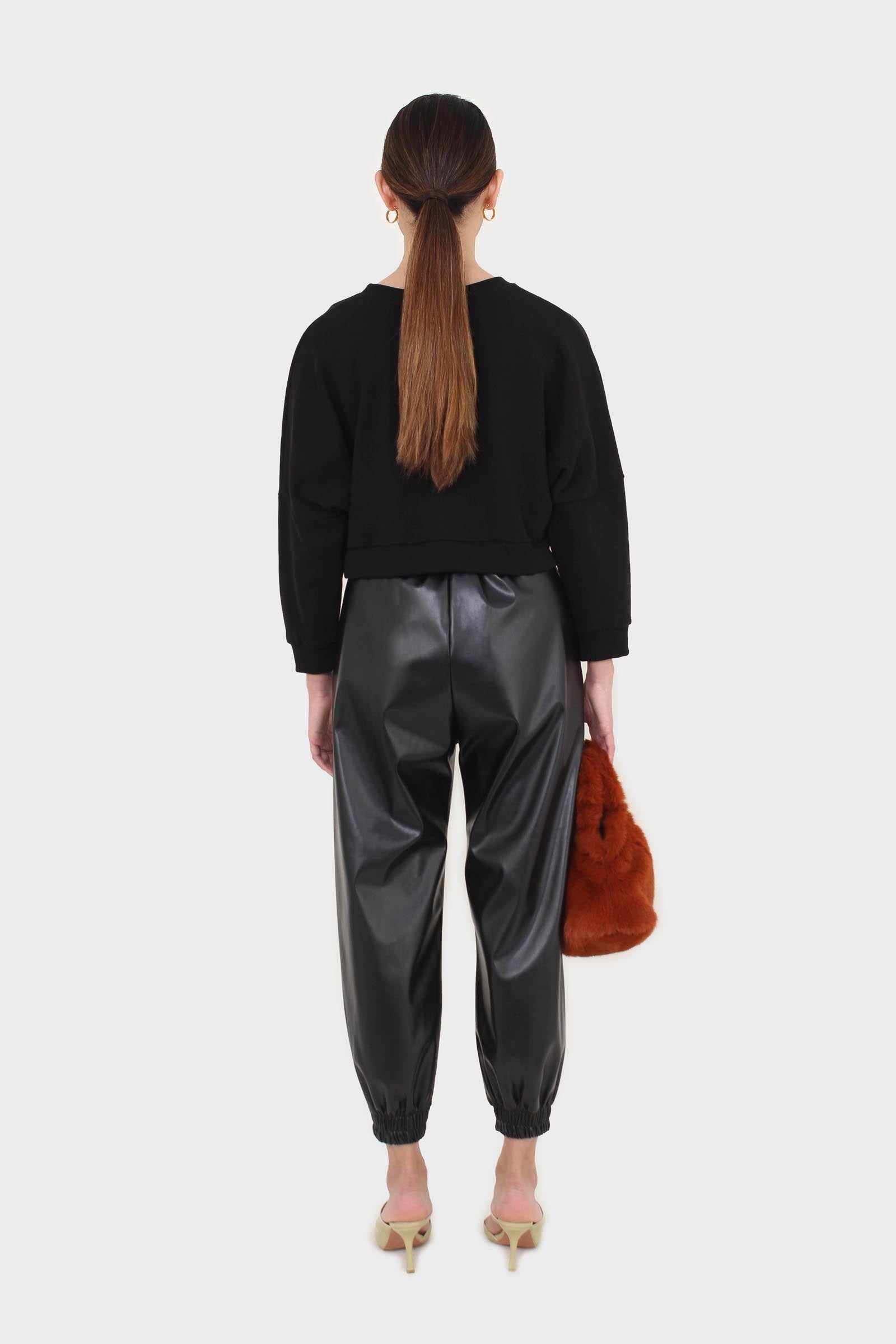 Black vegan leather jogging trousers