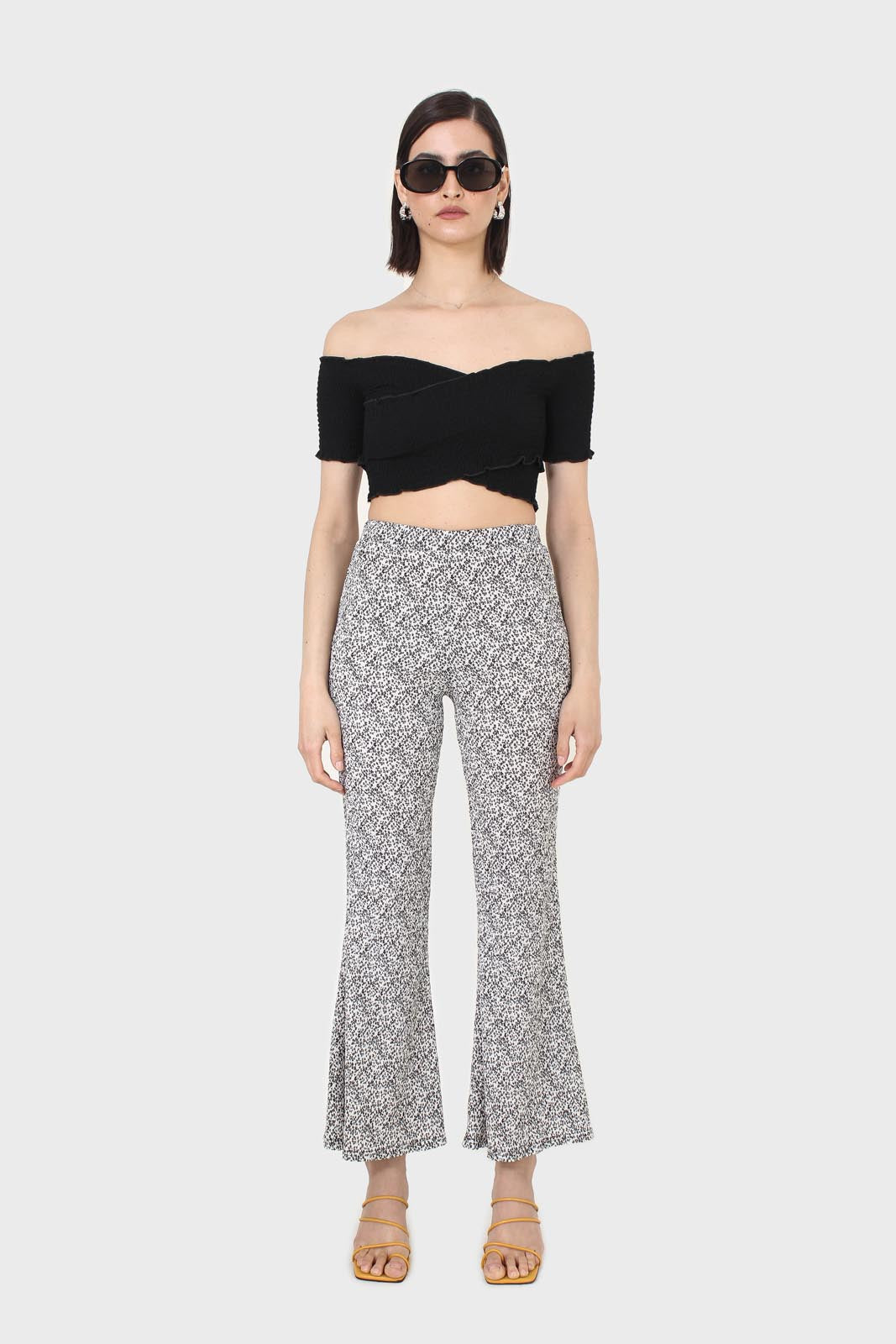 Ivory and charcoal dappled flare trousers