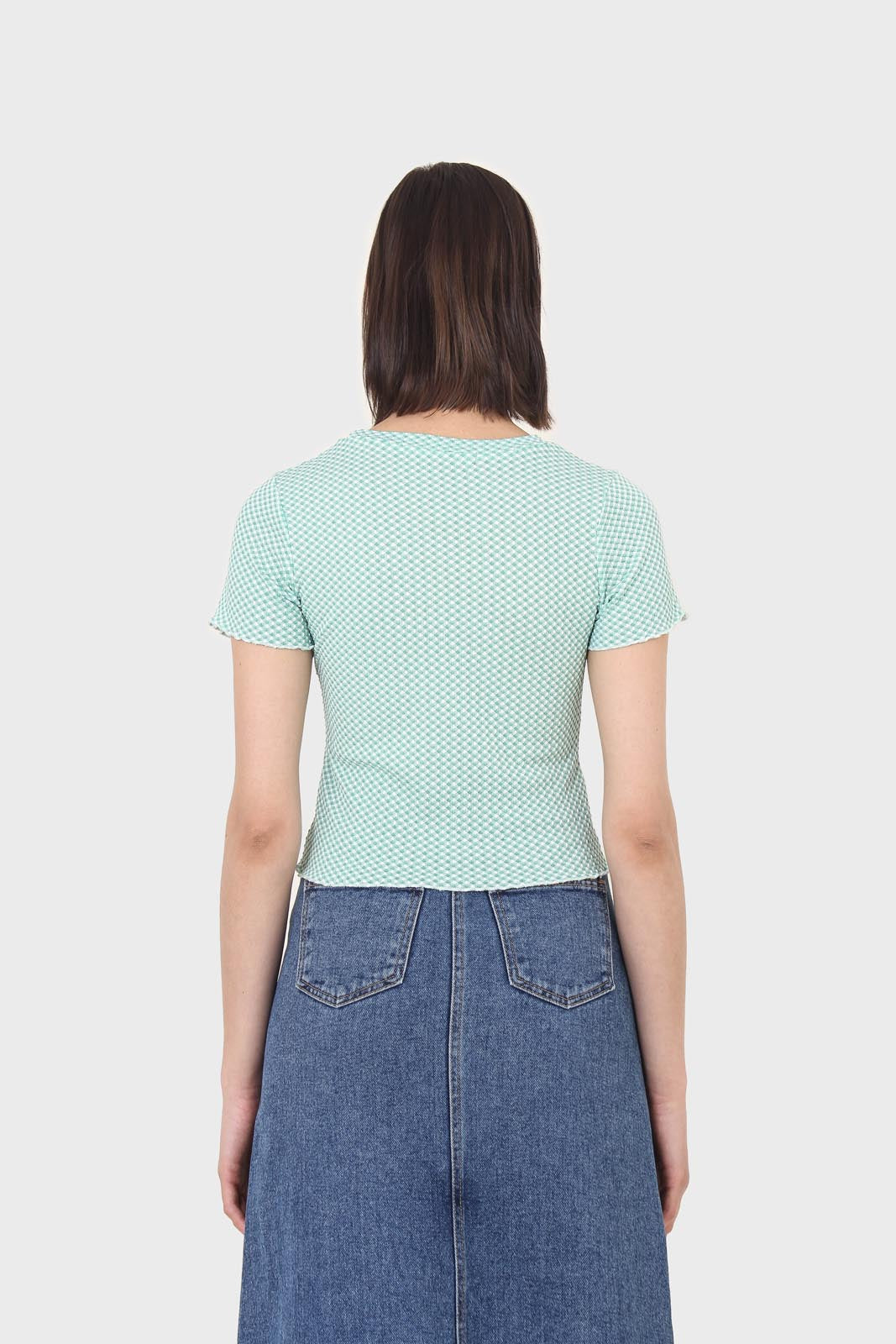 Green and ivory lettuce hem top