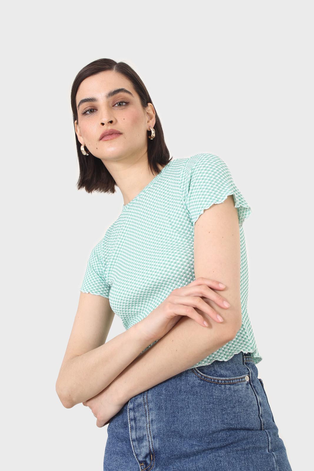 Green and ivory lettuce hem top