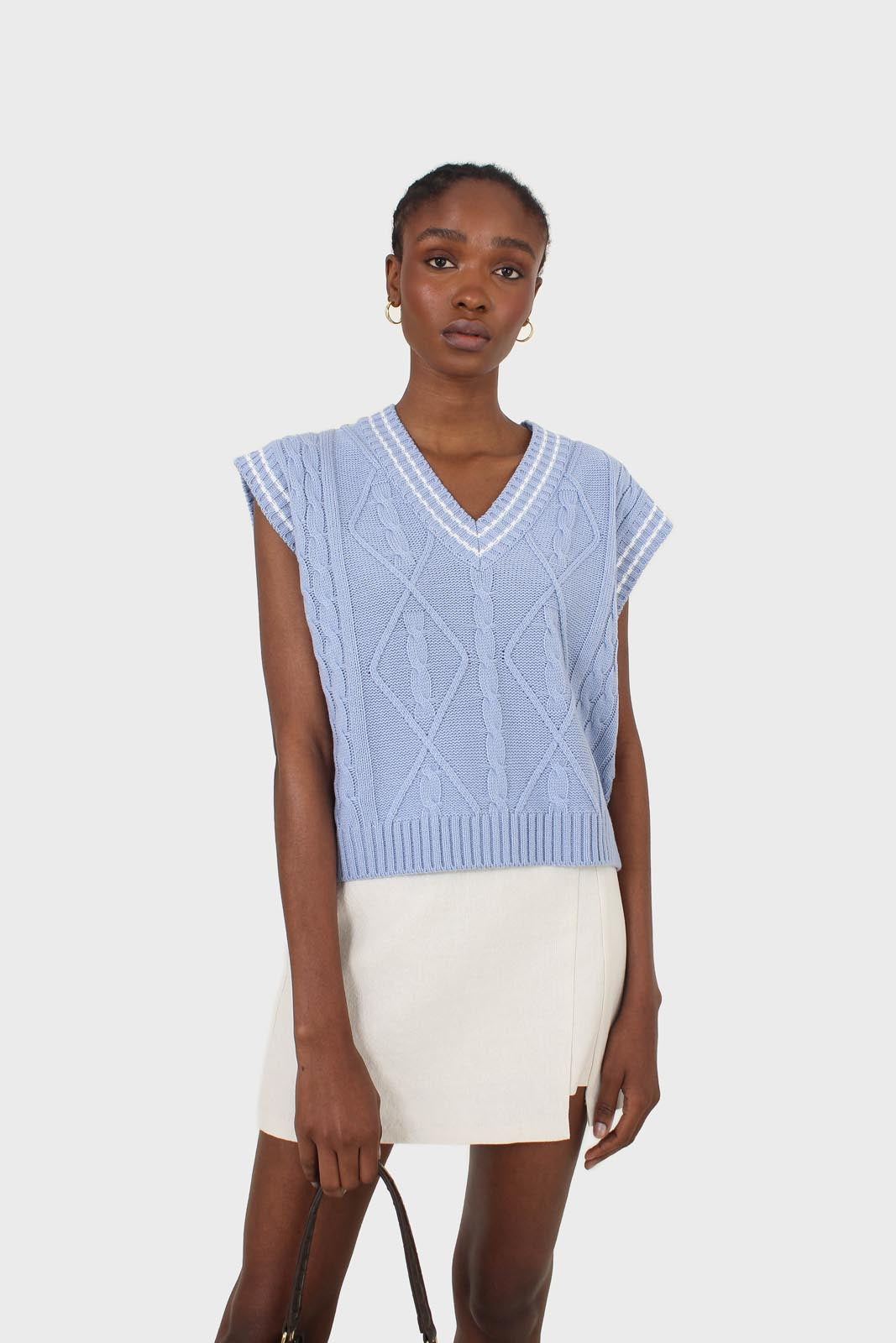 Light blue and white varsity cable sweater vest