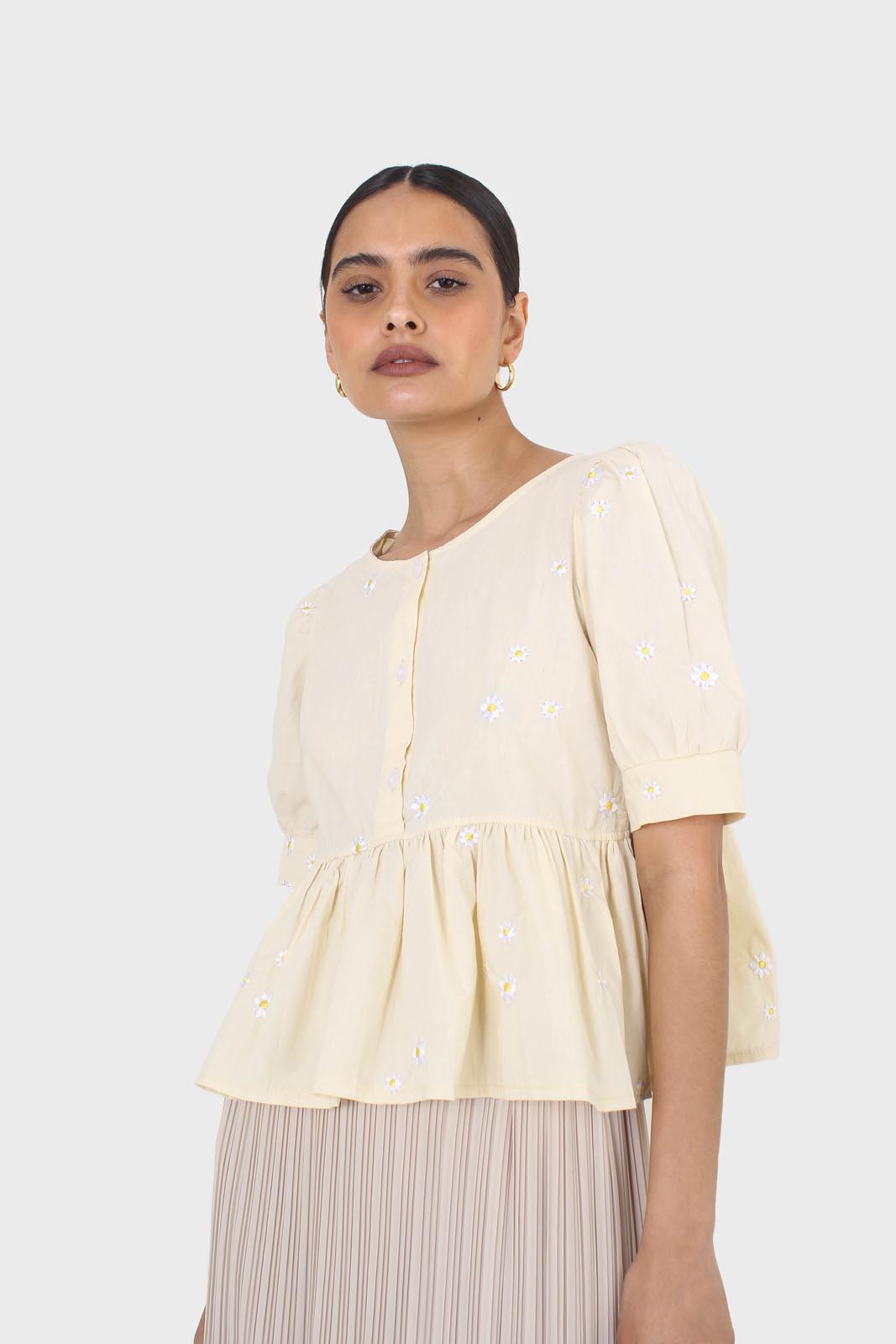 Yellow embroidered daisies peplum blouse