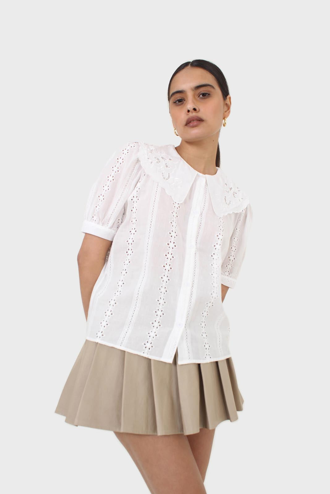 Beige waxed pleated mini skirt