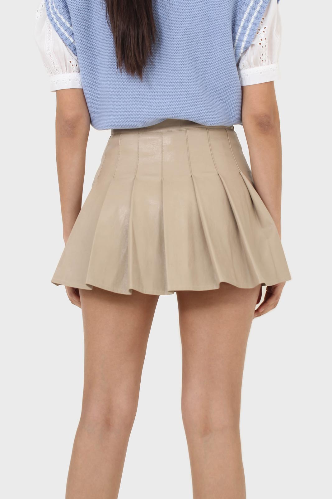 Beige waxed pleated mini skirt