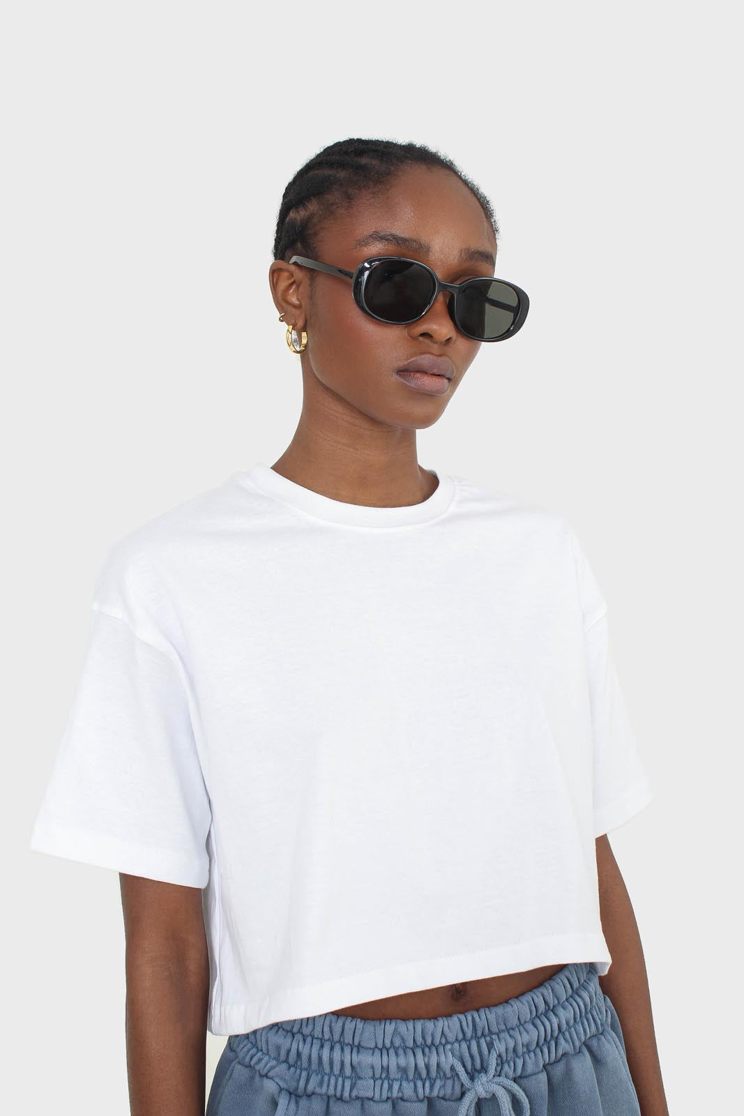 All black thick oval frame sunglasses