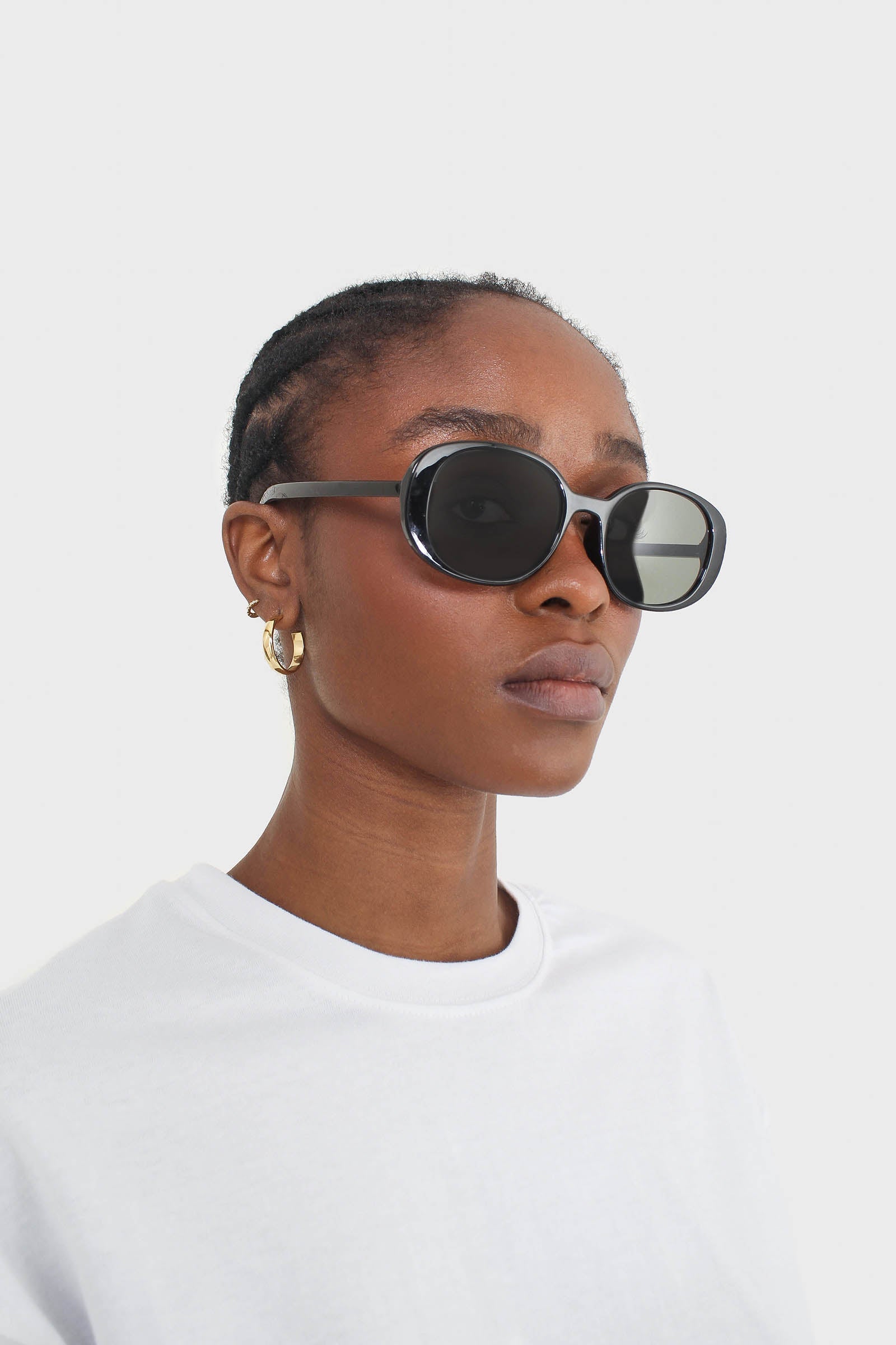 All black thick oval frame sunglasses