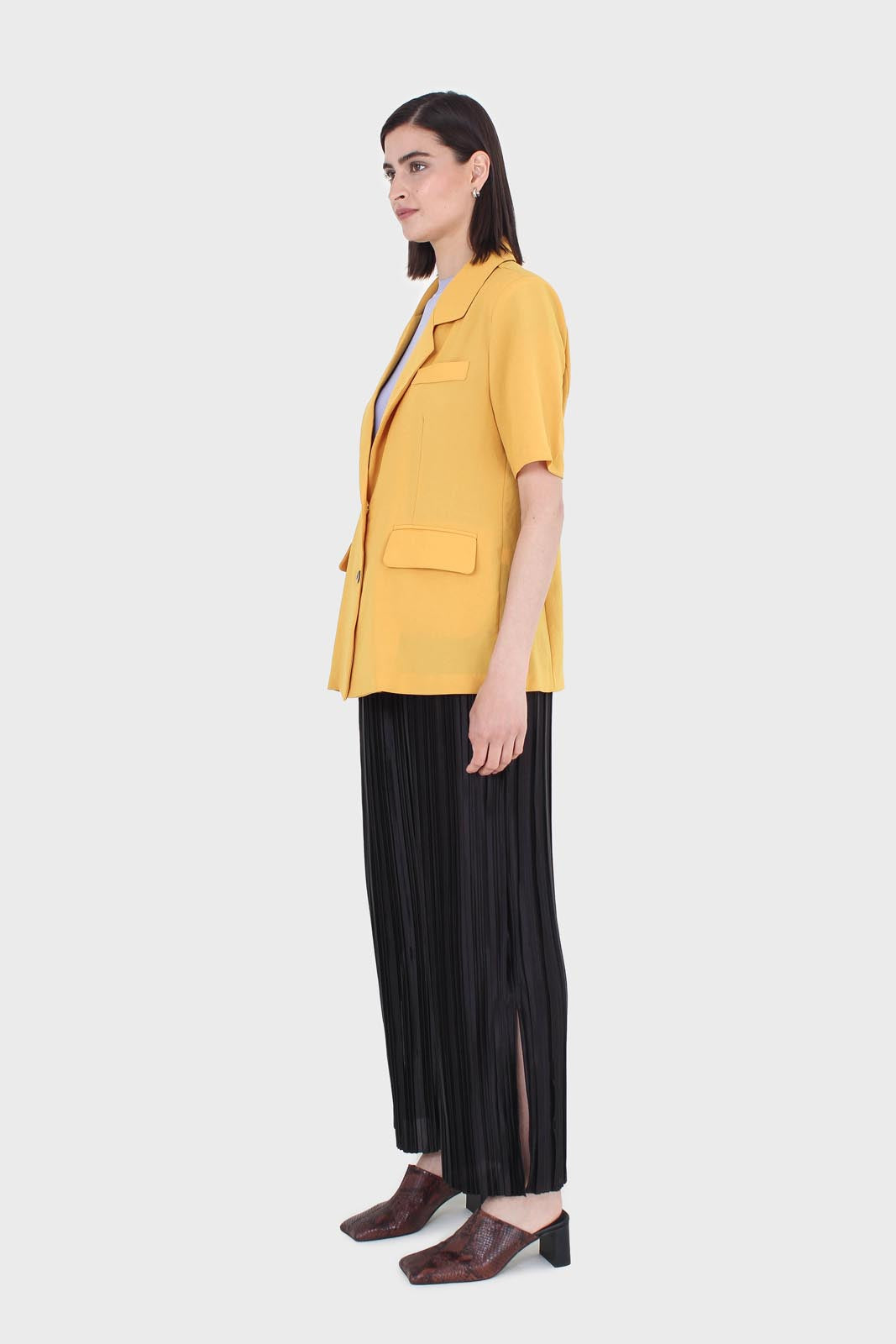 Bright yellow flap pocket oversized jacket