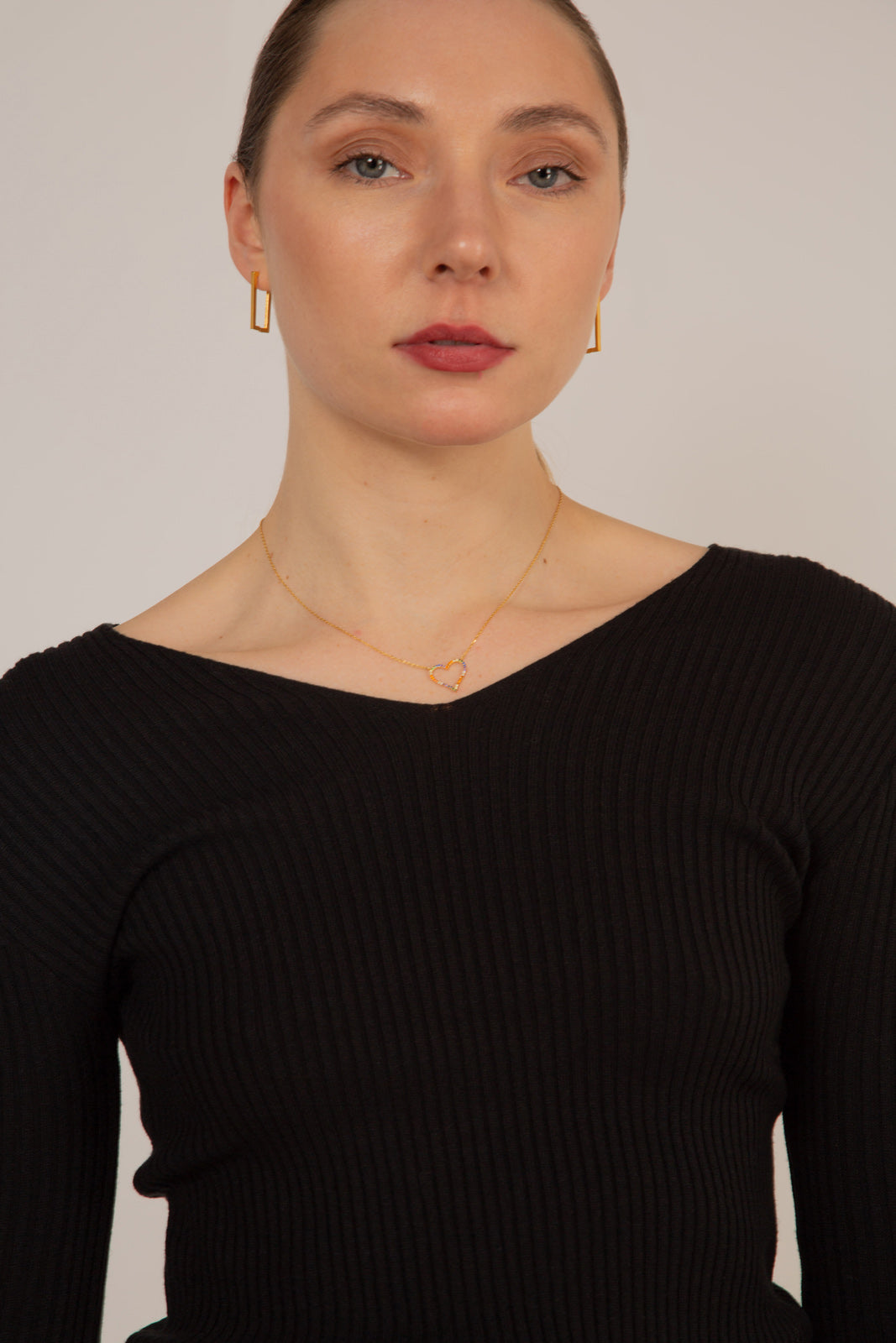 Black V-neck ribbed long sleeved knit top