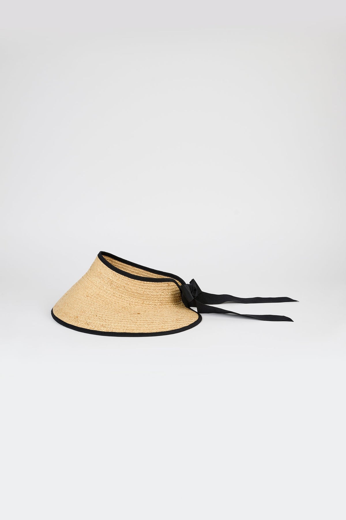 Beige raffia and black trimmed ribbon tie bonnet