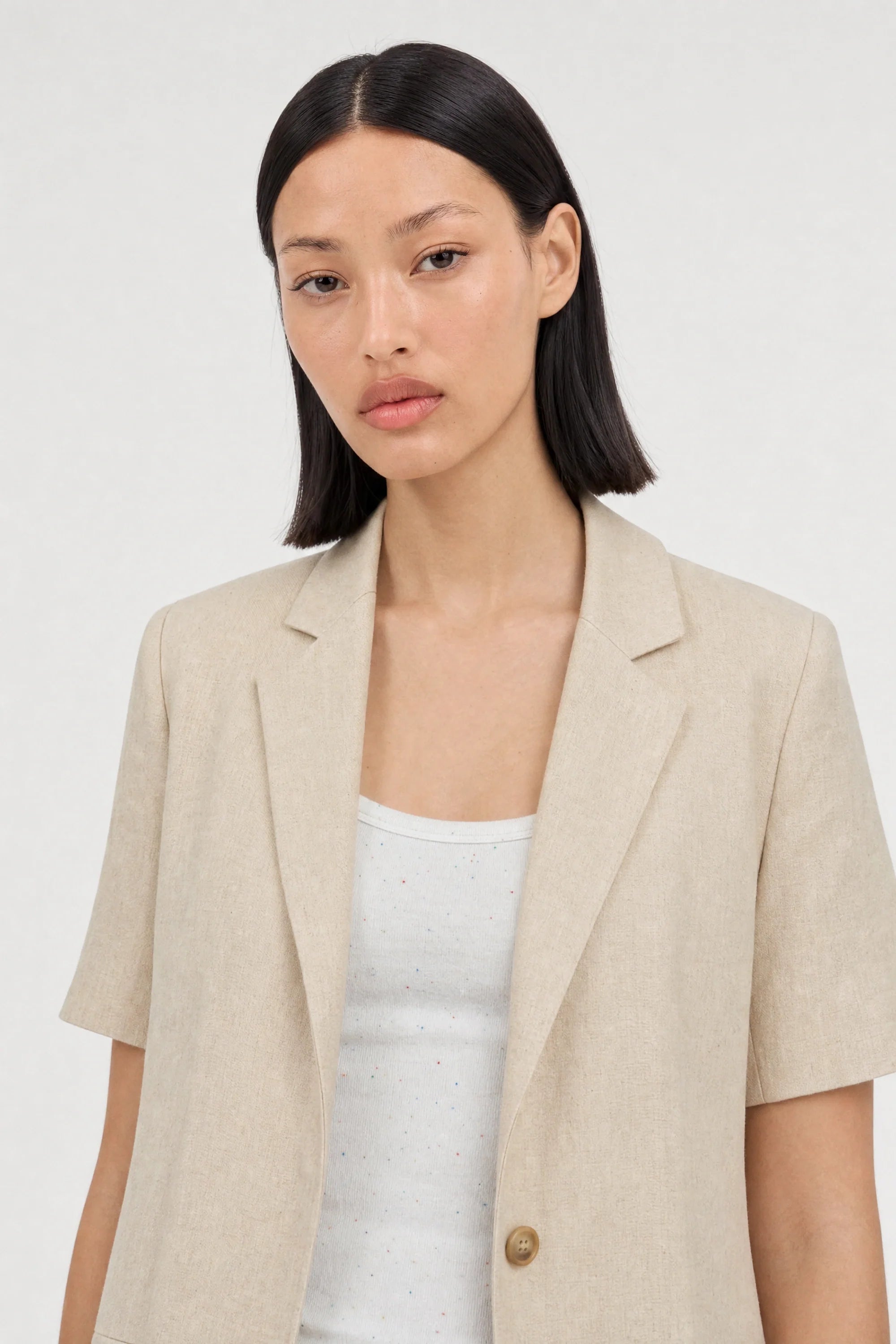 Beige short sleeved boxy blazer